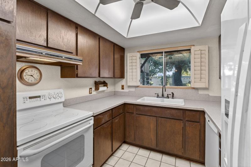 Kitchen overlooks backyard