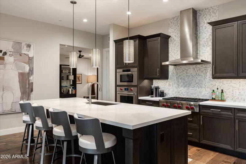 Open Kitchen and island with Den