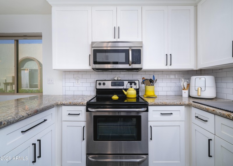 Crisp white shaker cabinets
