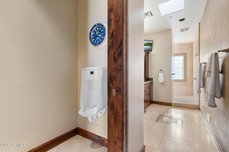 Primary Bathroom (His)