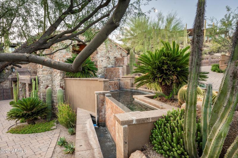 Lush Landscape with Fountain Water Featu