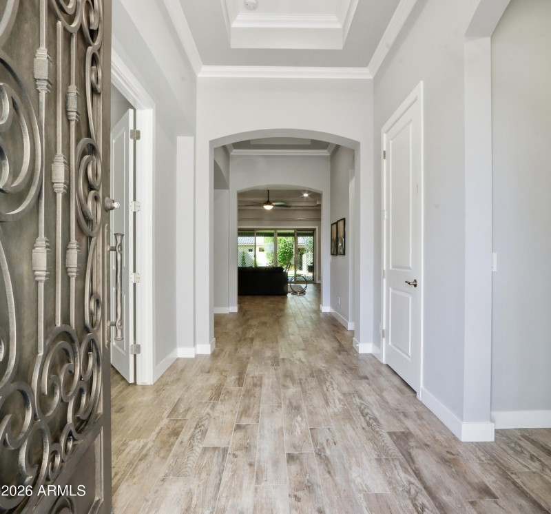 Welcoming Entry & Coffered Ceilings