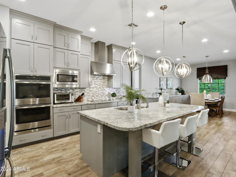 Huge Island & Stacked Cabinetry