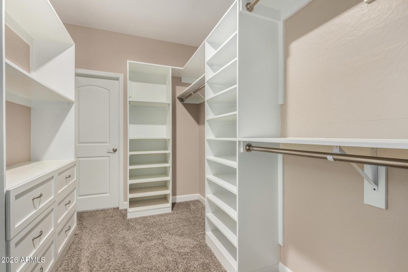 Custom-shelved Primary Closet
