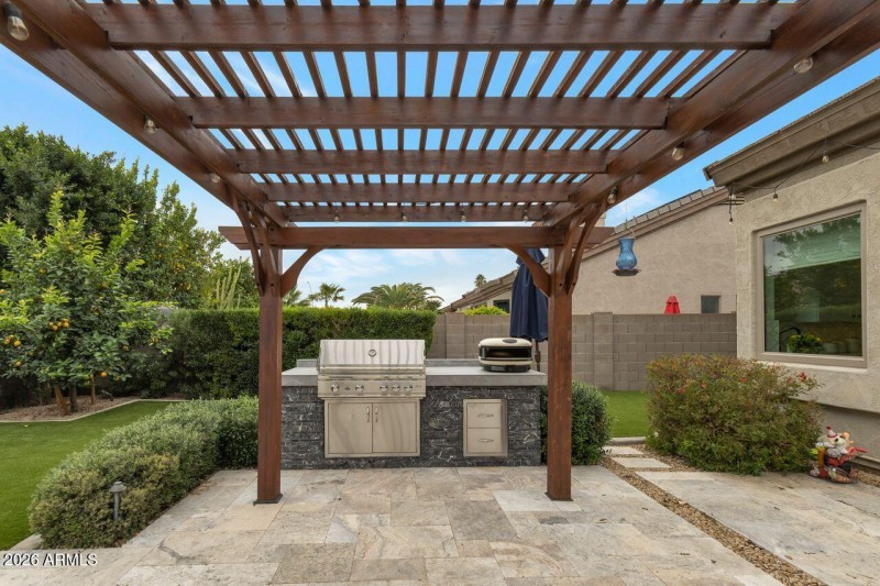 Custom ramada & built-in barbeque.