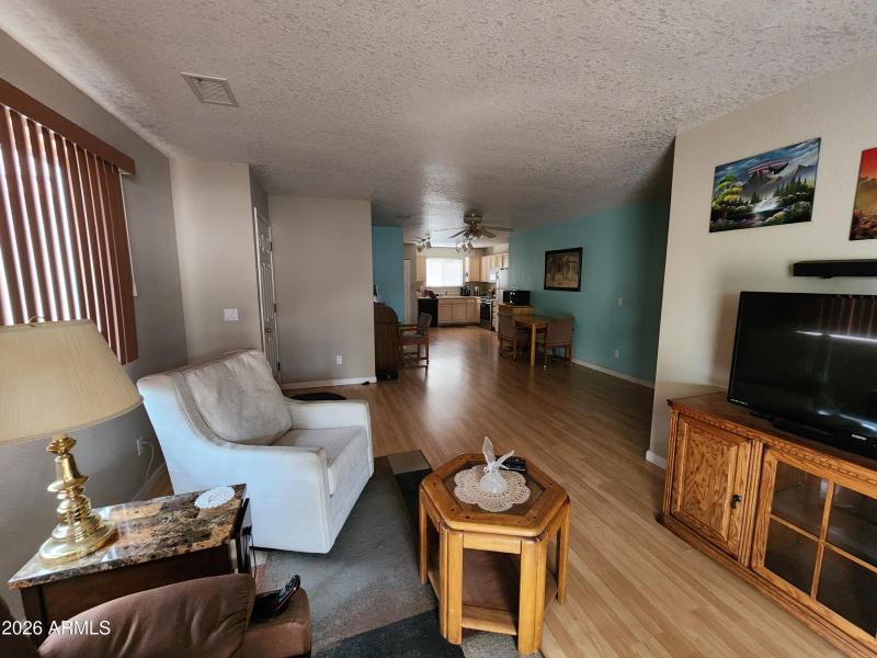 Living room looking into kitchen