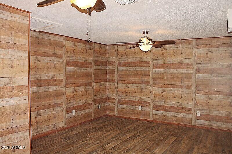 Primary bedroom wood walls