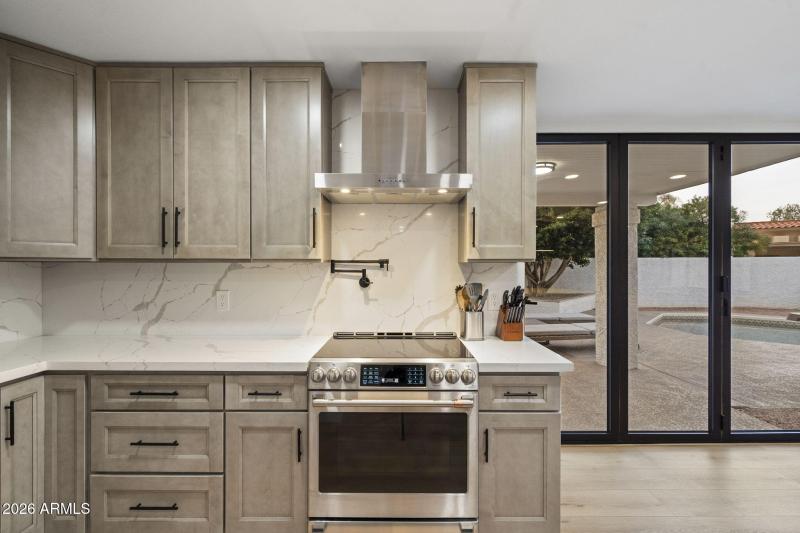 Modern Kitchen With Backyard View