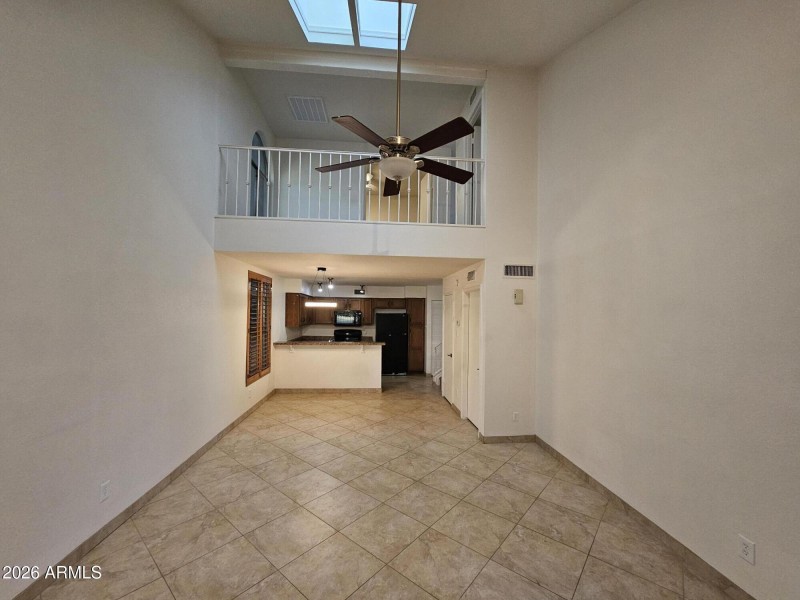 great room towards kitchen and skylight