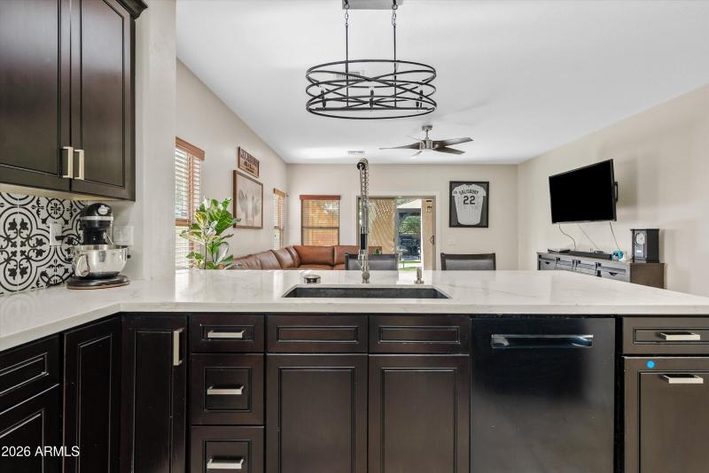 Quartz counters and custom backsplash