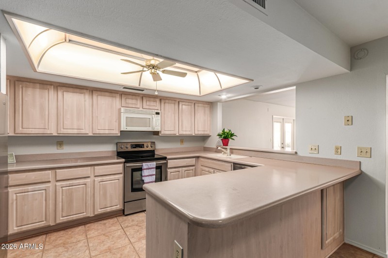 Open kitchen with breakfast bar