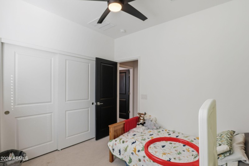 Bedroom With Closet & Ceiling Fan