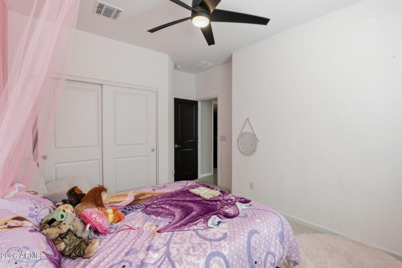 Bedroom With Dual Closets