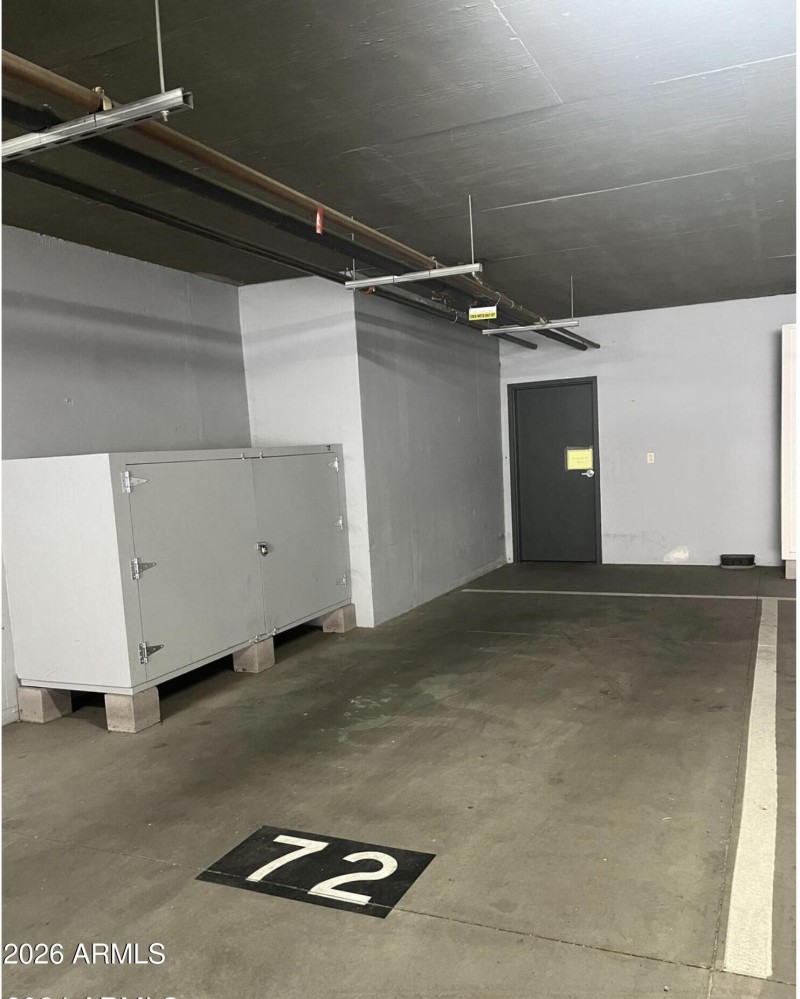 Extra wide parking space w/ storage
