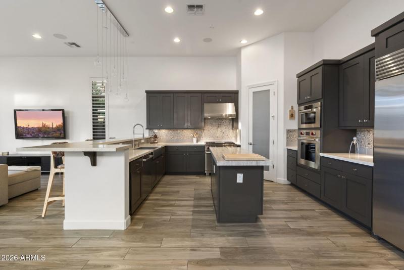 Kitchen w Custom Cabinetry & SZ Fridge