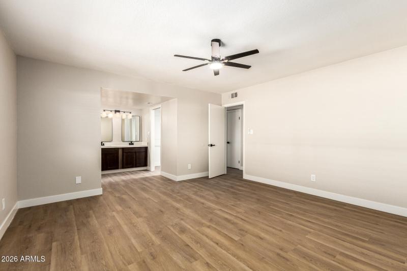 Primary Bedroom Looking to Bathroom