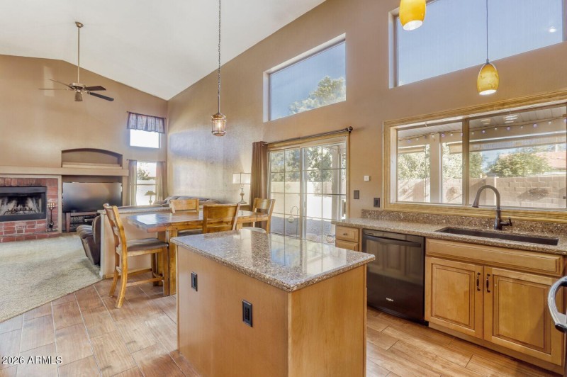 Kitchen offers access to covered patio