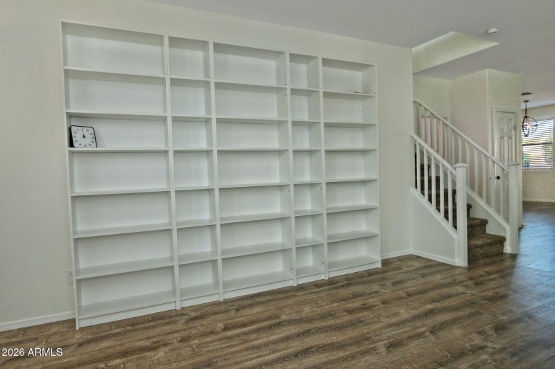 Built in shelves across from dining