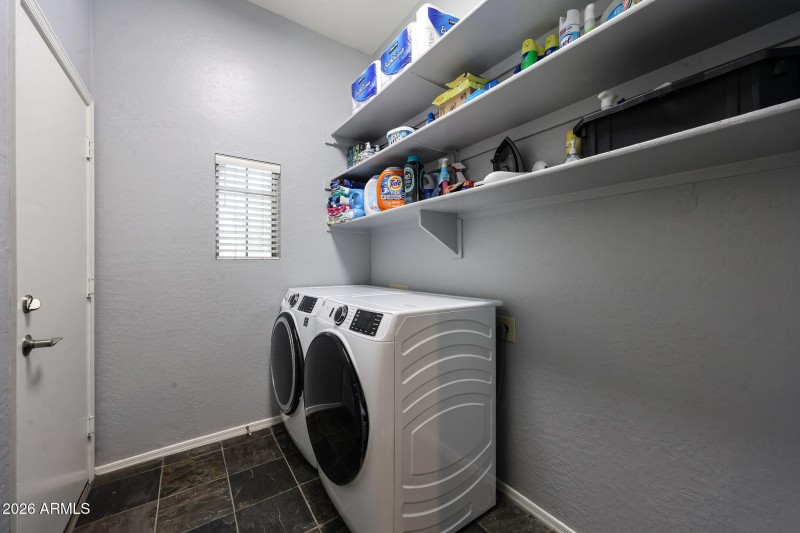 INSIDE LAUNDRY OFF THE TWO CAR GARAGE