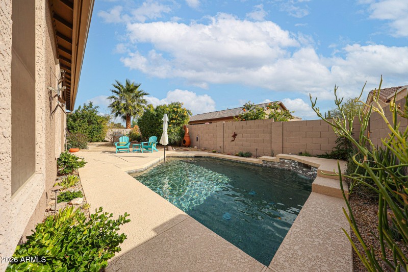 CORNER POOL GIVING MORE OUTDOOR SPACE