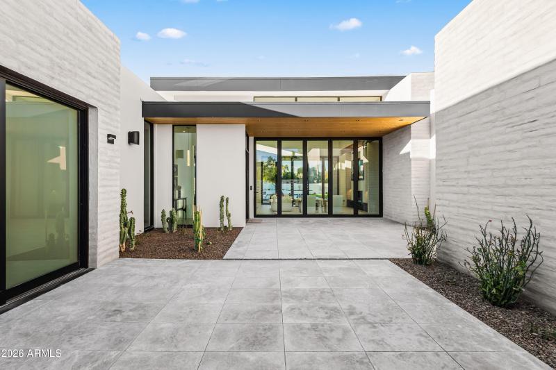 FRONT GATED COURTYARD/ ENTRY