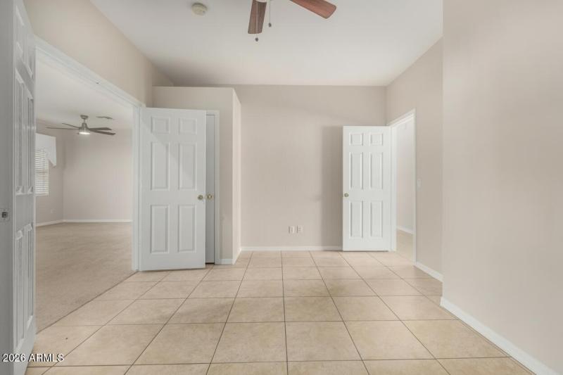 Tiled Den With French Door Entry