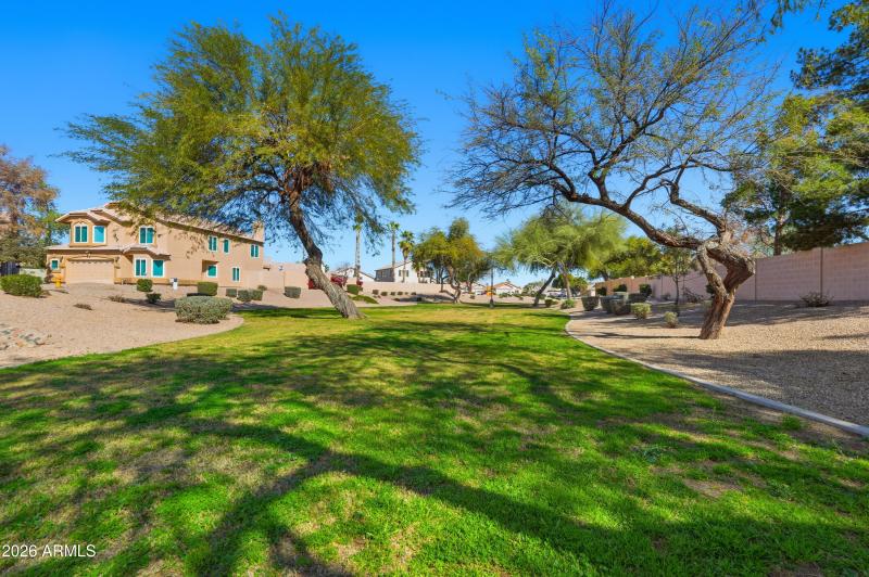 Surrounded by greenbelts and play areas.