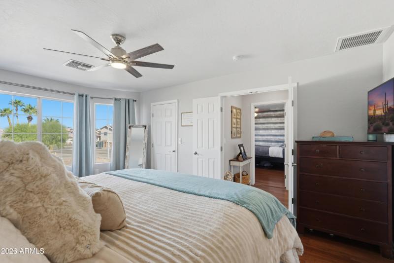 Another view of the primary bedroom