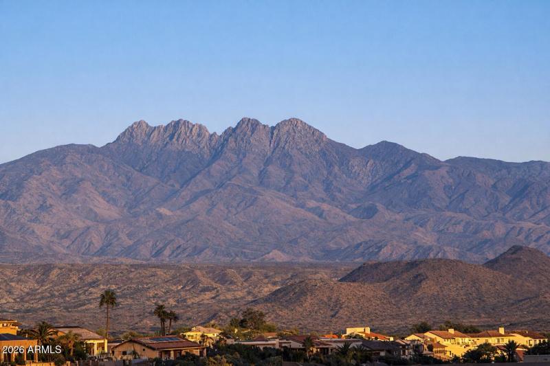 Four Peaks over desert homes