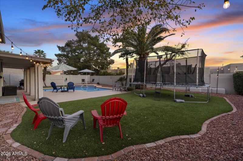 Resort like yard with artificial turf