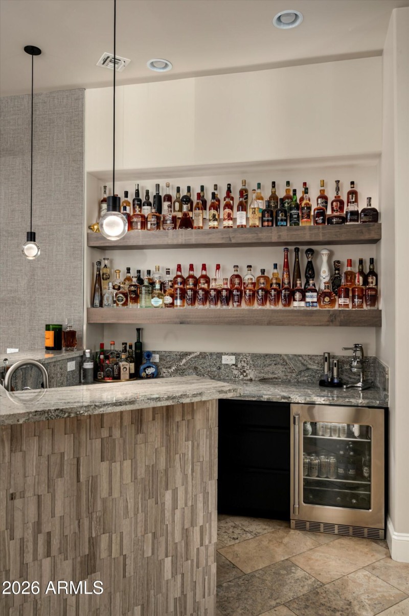 Wet bar with sink and refrigeration