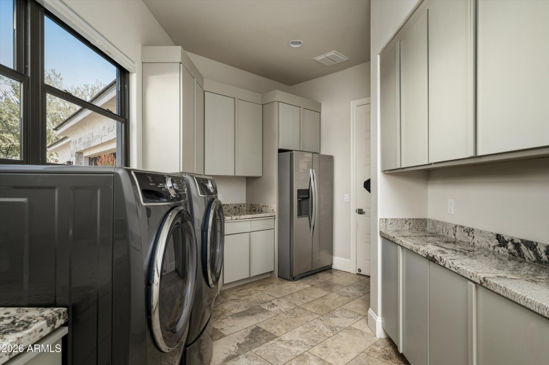 Laundry room with tons of storage
