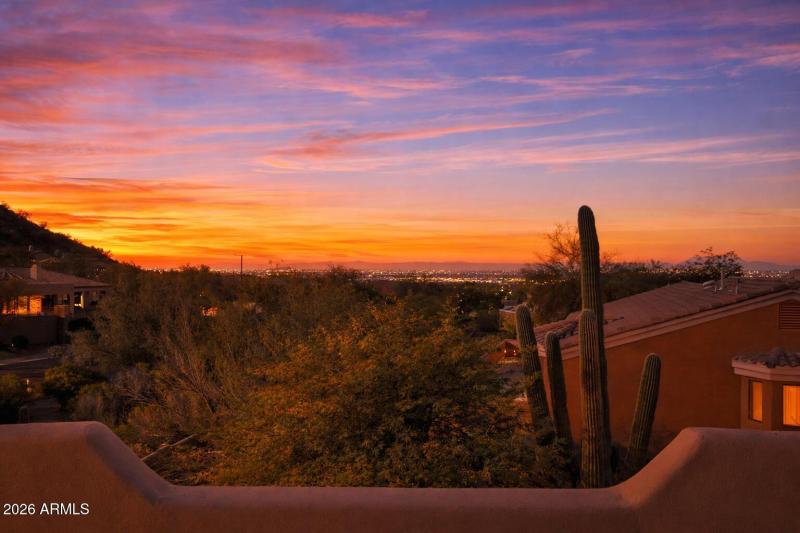 sunset city lights view deck