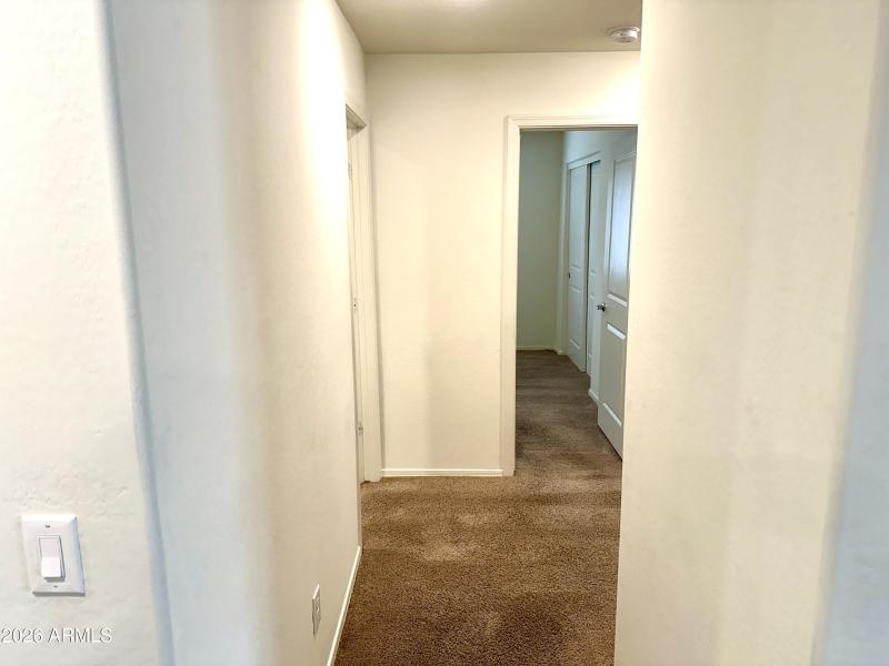 Hall to additional bedrooms