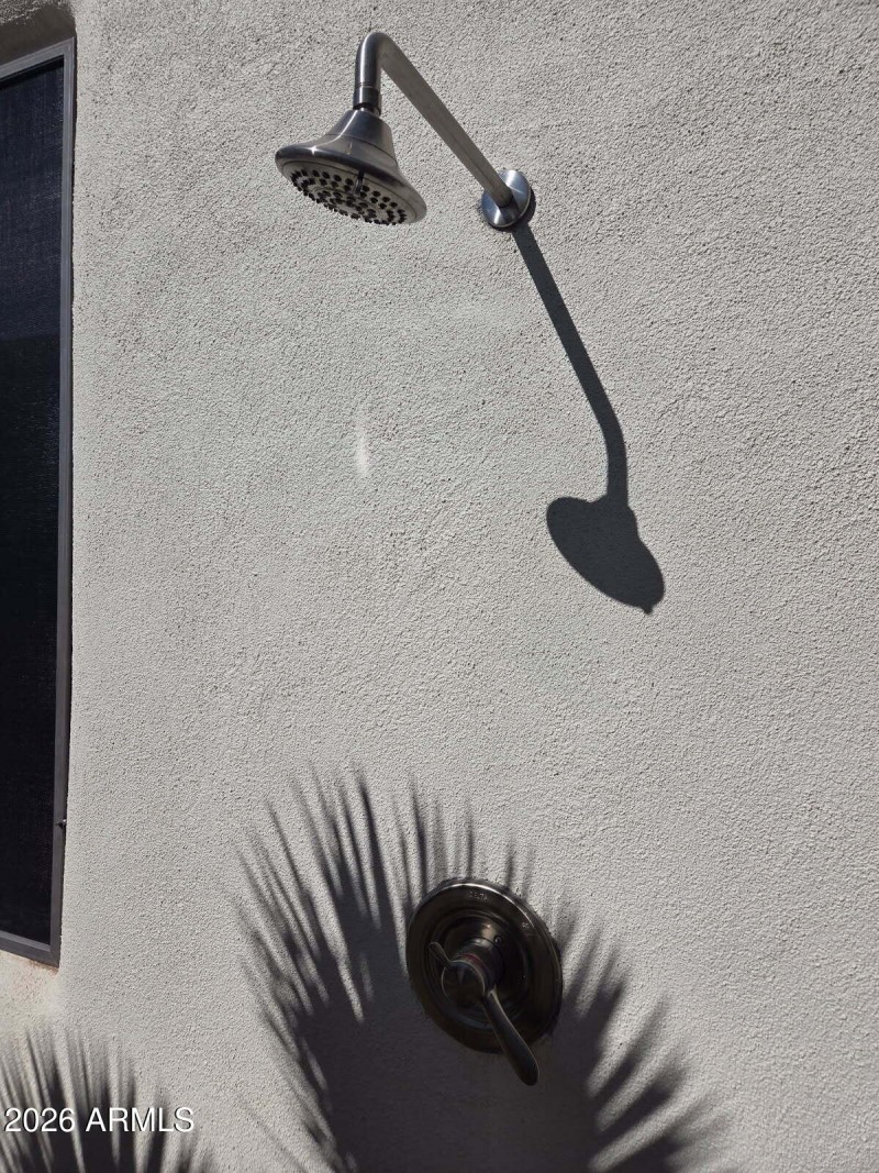 outdoor shower with hot water