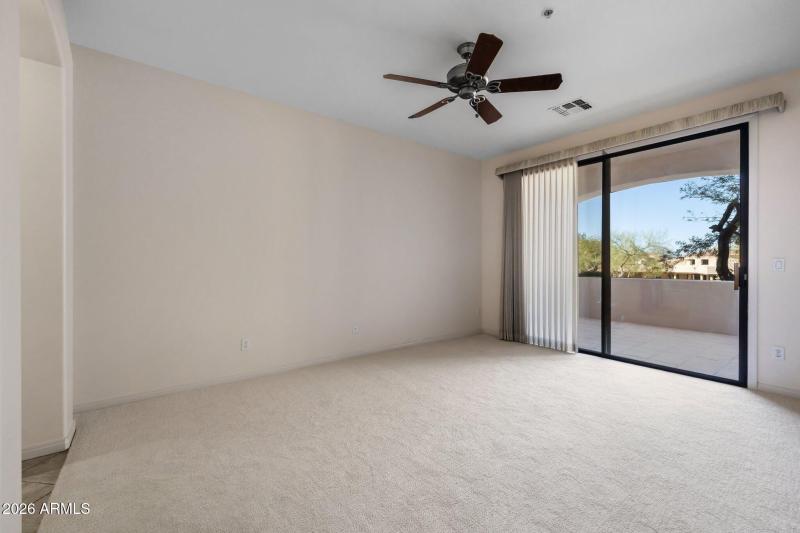 Spacious master with tiled patio