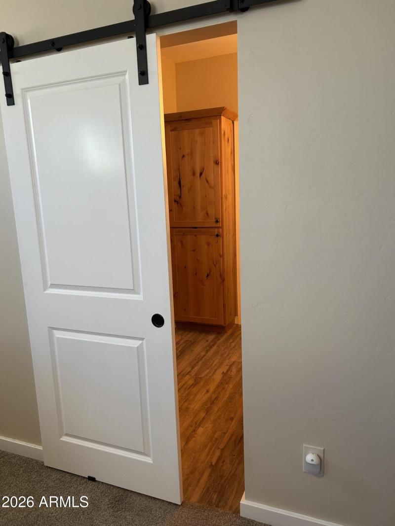 Barn Door to the Primary Bathroom