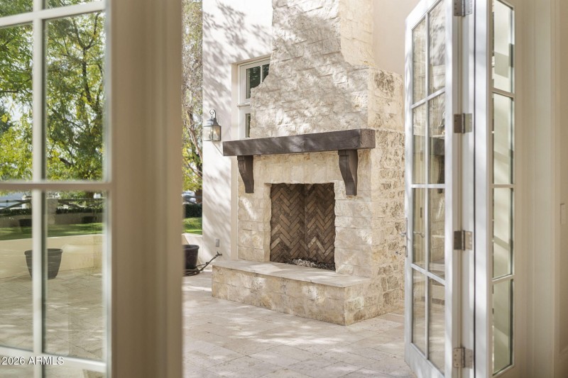 Exeter Blvd Front Courtyard Fireplace