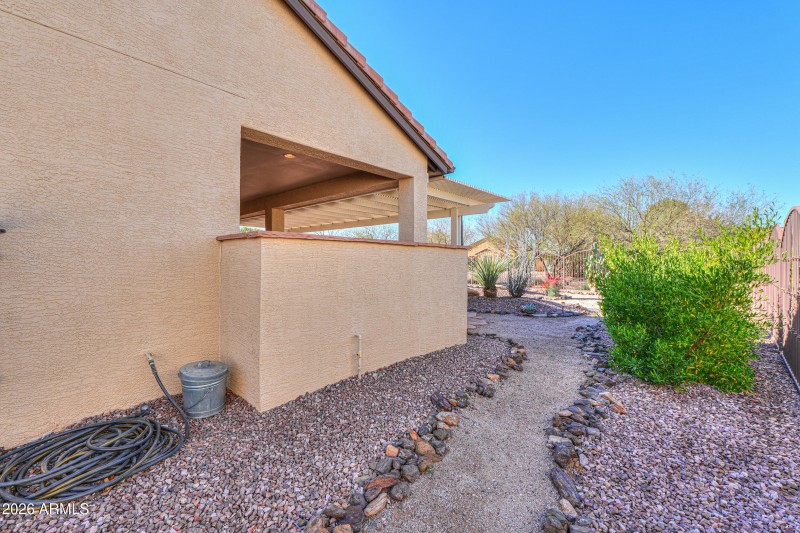 Side of home w/walking paths