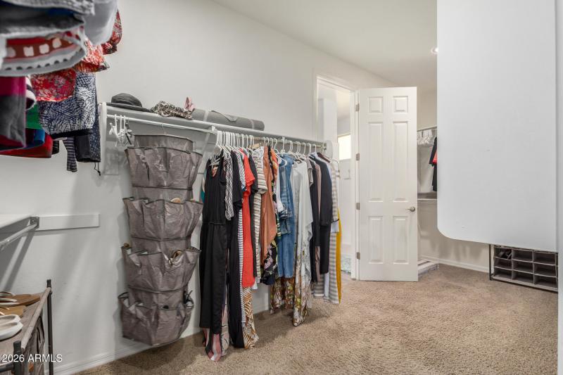 Primary closet to laundry room