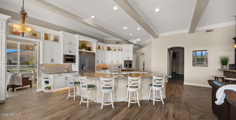 Custom cabinetry with glass toppers