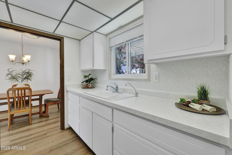 Kitchen window overlooks private patio