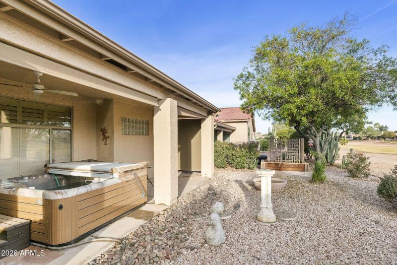 Back patio with hot tub