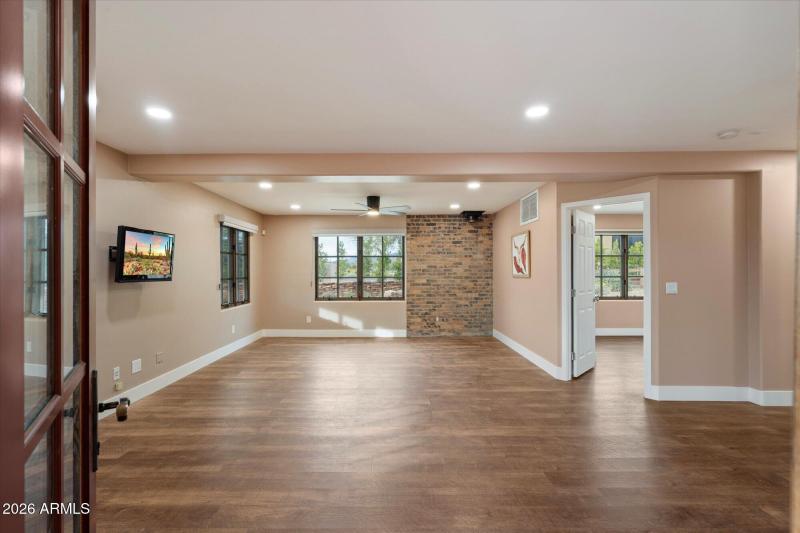 Brick Accent Wall & Wood Flooring