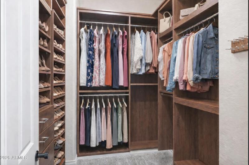 Primary Closet 1 Virtually Staged