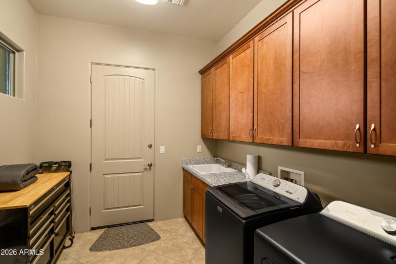 Laundry Room w cabinets & utility sink