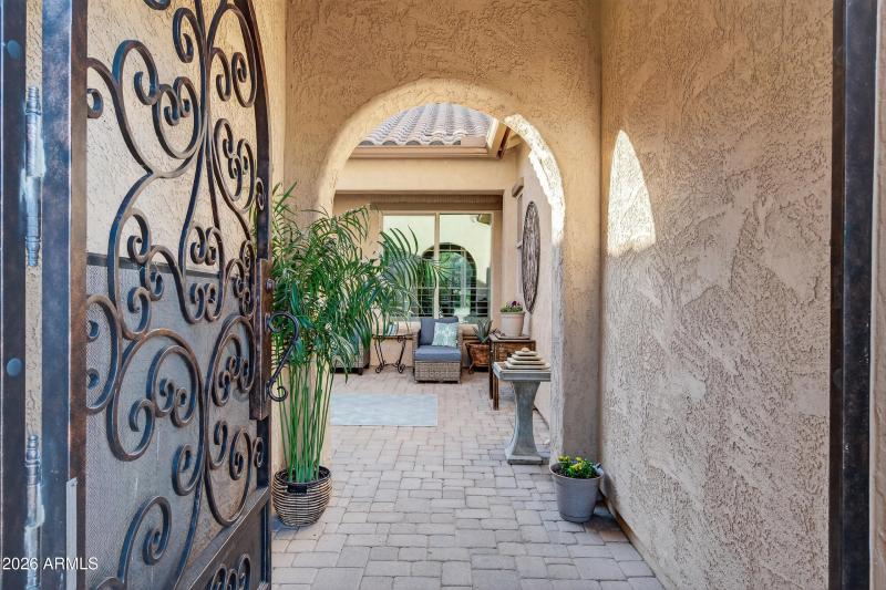 Enter through gate to the courtyard