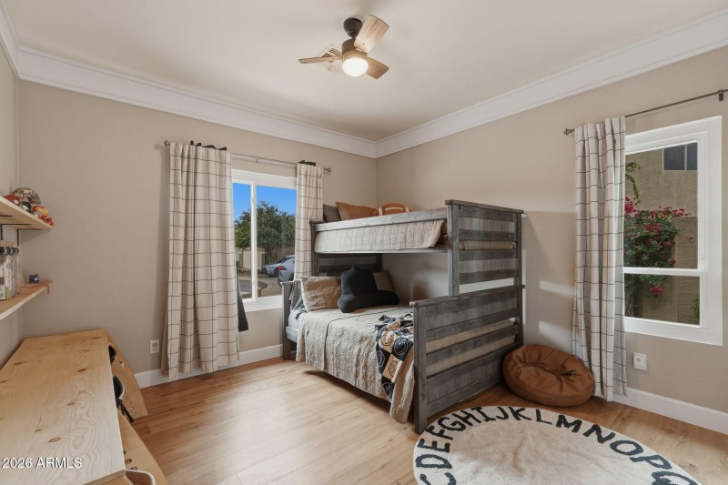 Bright bedroom with crown molding