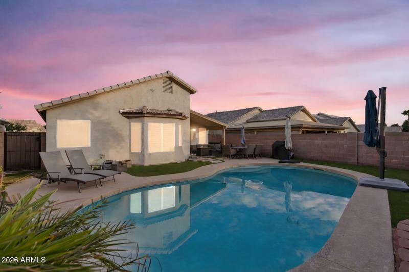 Arizona sunset over sparkling pool