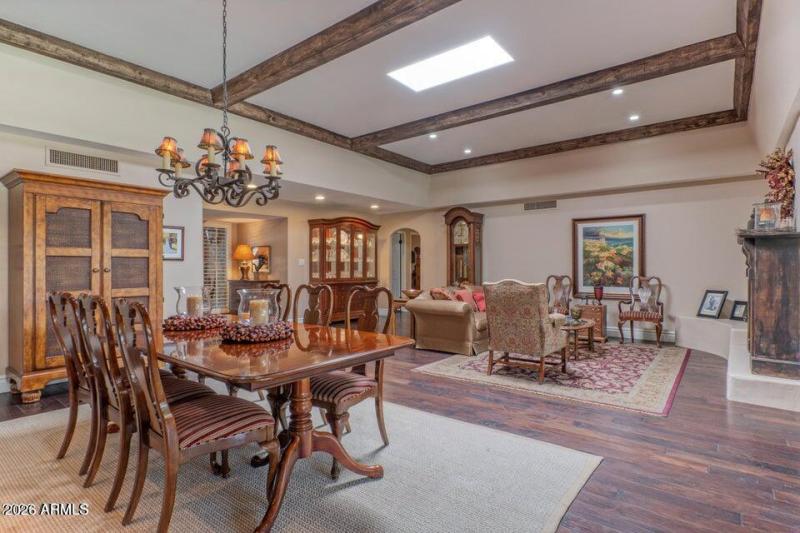 Living/dining soaring beamed ceiling